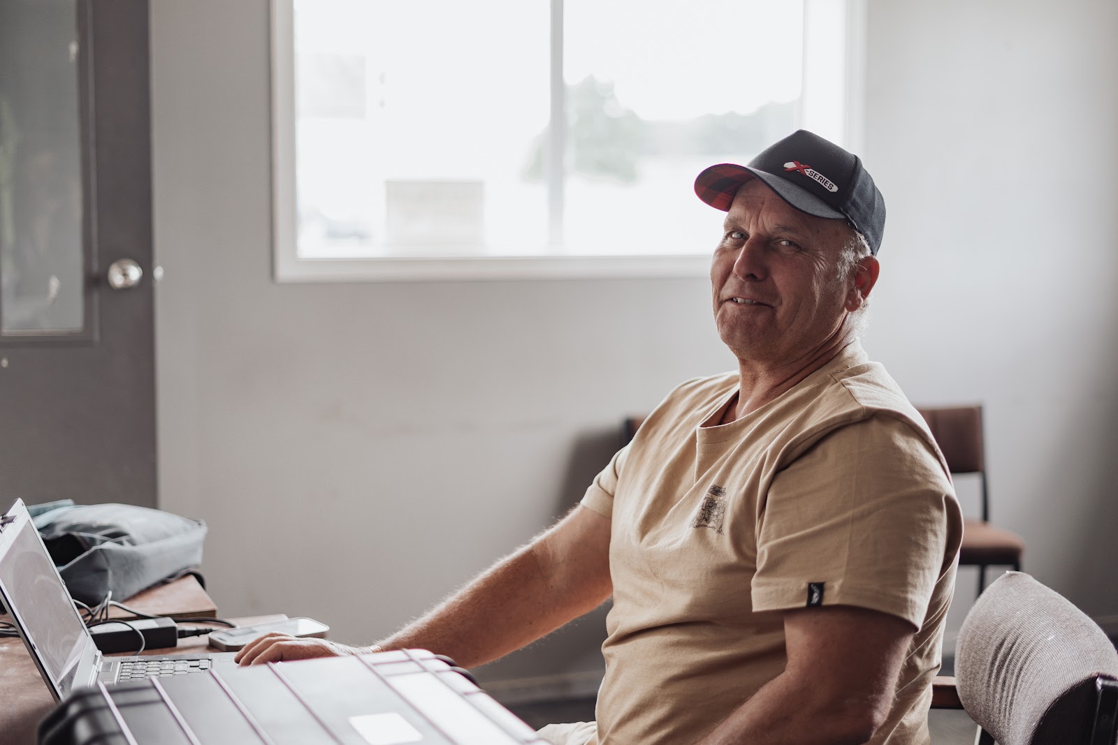 Gareth Holmes at the workshop office desk